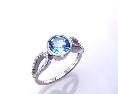 9ct White Gold Ring with Round Blue Topaz and Small Diamonds  9tpr0013